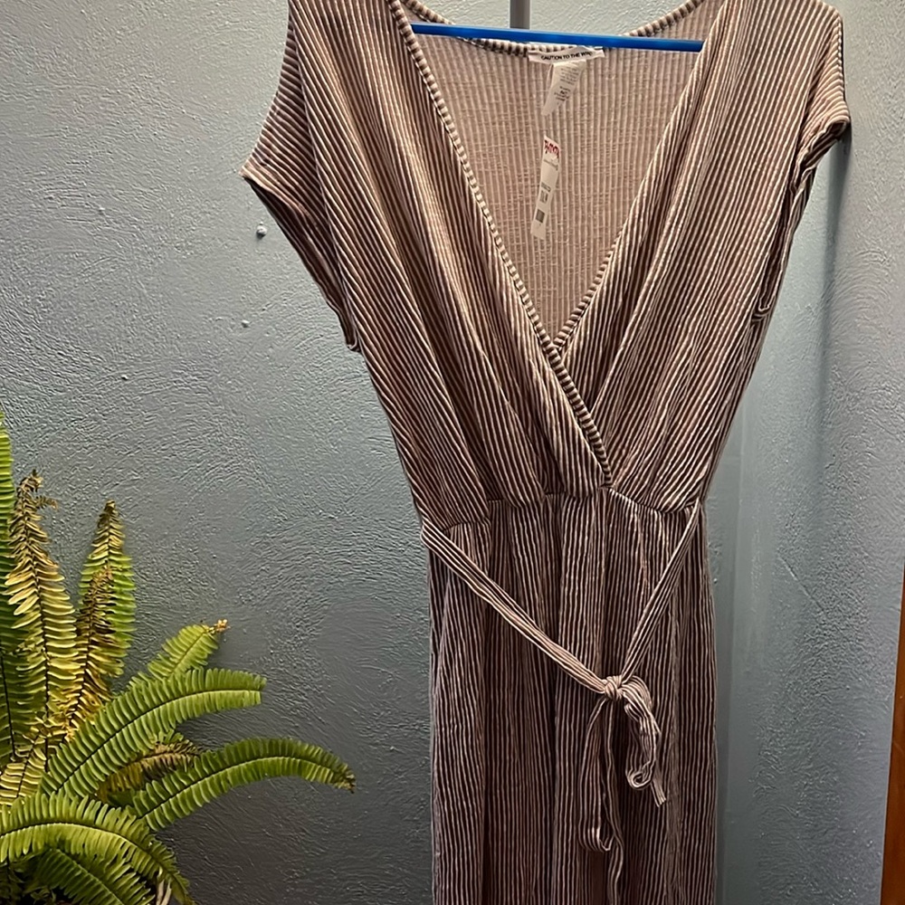 New with tags women’s size L jumpsuit.